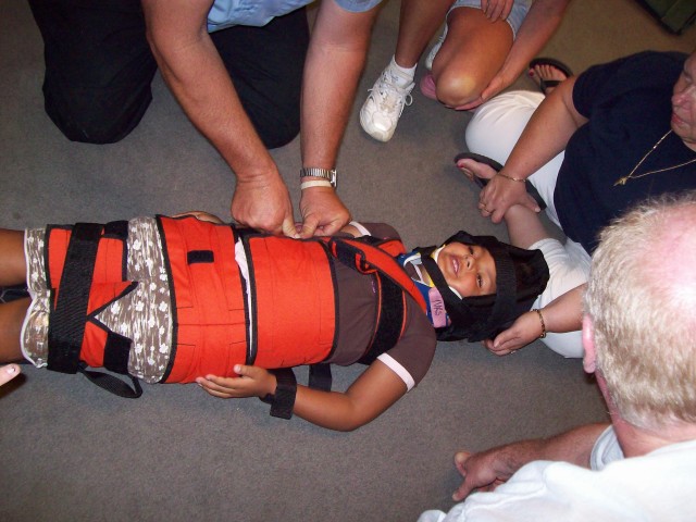 8/20/09- Pediatric Drill, Corey is strapped to the Pediatric Immobilization board